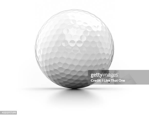 golfball on white background - balle de golf photos et images de collection