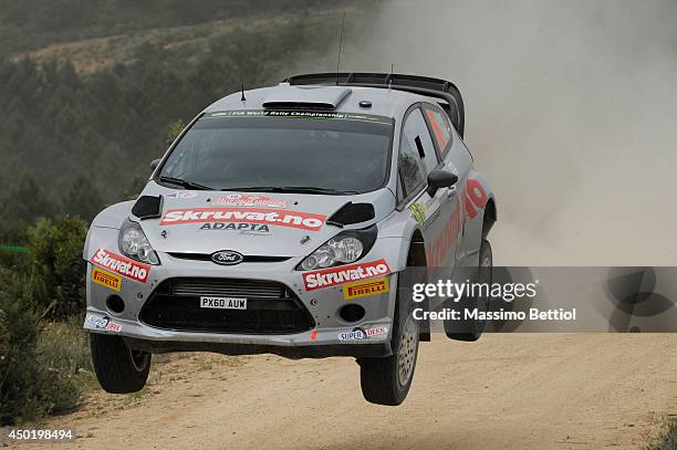 Henning Solberg of Norway and Ilka Minor of Austria compete in their Ford Fiesta RS WRC during Day One of the WRC Italy on June 6, 2014 in Olbia,...