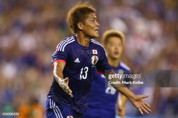 Yoshito Okubo of Japan celebrates scoring a goal during the International Friendly Match between Japan and Zambia at Raymond James Stadium on June 6,...