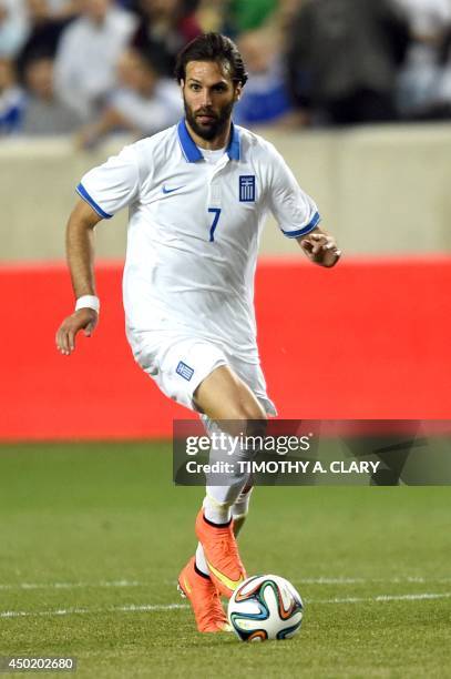 Greece's Giorgos Samaras moves the ball against Bolivia during an international friendly match at Red Bull Arena on June 6, 2014 in Harrison, New...
