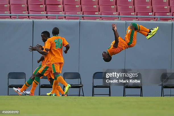 Emmanuel Mayuka of Zambia performs a bacflip as he celebrates a goal by Felix Katongo of Zambia during the International Friendly Match between Japan...