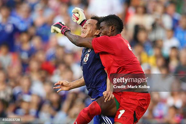 Shinji Okazaki of Japan collides with Toaster Nsabata of Zambia during the International Friendly Match between Japan and Zambia at Raymond James...
