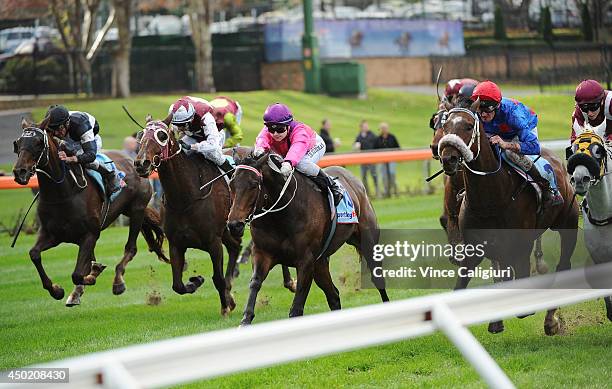 Brad Rawiller riding Wish Come True defeats Kayla Nisbet riding Voila Ici in Race 6, the Boscastle Handicap during Melbourne Racing at Moonee Valley...