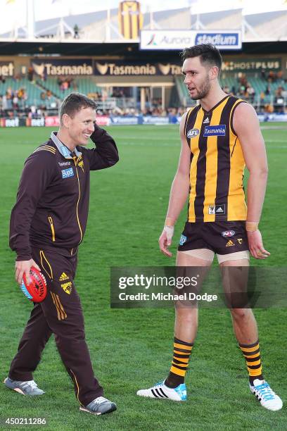 Stand-in Hawks coach Brendon Bolton celebrates the win with Jack Gunston of the Hawks during the round 12 AFL match between the Hawthorn Hawks and...