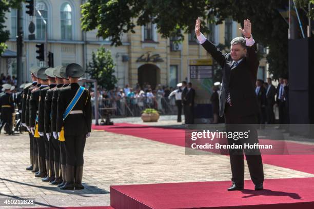 Ukraine's new president, Petro Poroshenko, waves during inaugural festivities on June 7, 2014 in Kiev, Ukraine. Poroshenko was elected on May 25 with...
