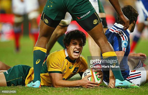 Matt Toomua of the Wallabies celbrates scoring a try during the First International Test Match between the Australian Wallabies and France at Suncorp...