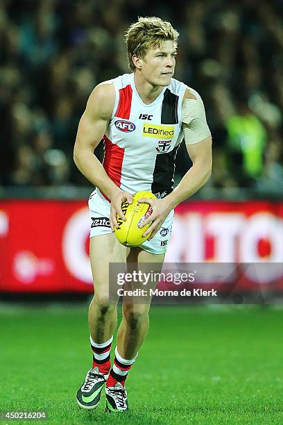 Jack Newnes of the Saints runs with the ball during the round 12 AFL match between the Port Adelaide Power and the St Kilda Saints at Adelaide Oval...