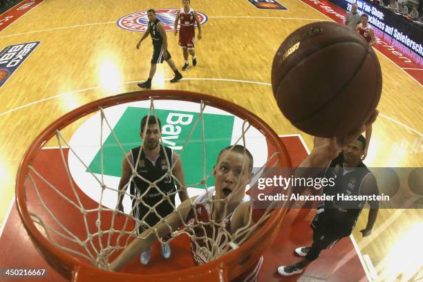 Robin Benzing of Muenchen scores a point during the Beko Basketball Bundesliga match between FC Bayern Muenchen and WALTER Tigers Tuebingen at...