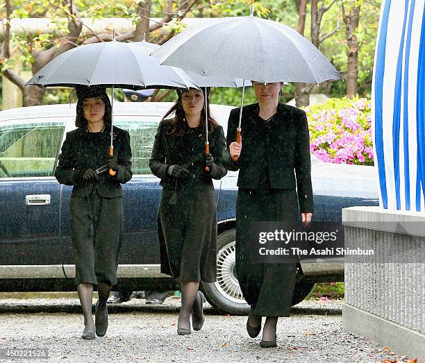 Princess Yoko and Princess Akiko of Mikasa attend the memorial ceremony to commemorate Prince Tomohito of Mikasa at Toshimagaoka Cemetery on June 6,...