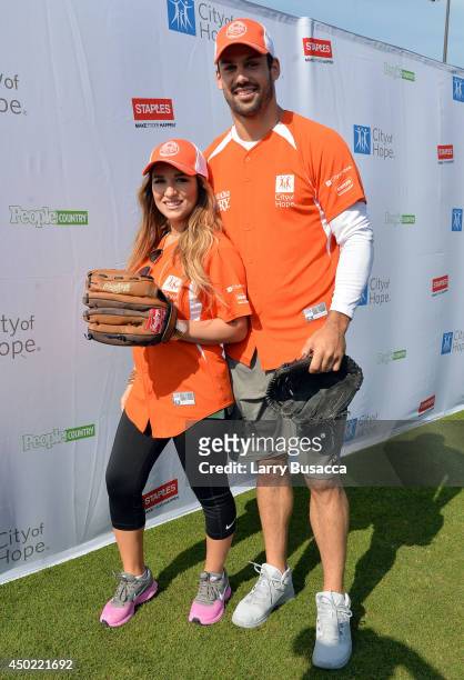 Jessie James Decker and Eric Decker attend the City of Hope Celebrity Softball Game during the CMA Festival at Greer Stadium on June 7, 2014 in...