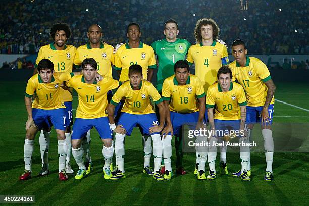 Dante, Maicon, Jo, goalkeeper Victor, David Luiz, Luiz Gustavo. Oscar, Maxwell, Neymar, Paulinho and Bernard of Brazil pose for their team photo...