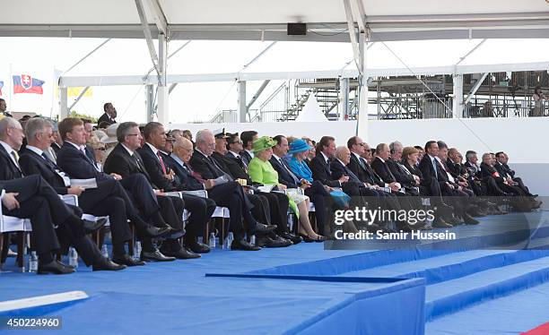 Queen Elizabeth II sits among Heads of State, including U.S. President Barack Obama, Prince Albert of Monaco, Russian President Vladimir Putinas and...
