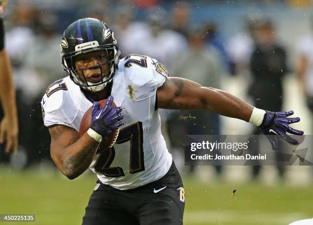 Ray Rice of the Baltimore Ravens runs for a touchdown against the Chicago Bears at Soldier Field on November 17, 2013 in Chicago, Illinois.