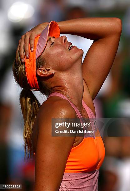 Maria Sharapova of Russia celebrates victory during her women's singles final match against Simona Halep of Romania on day fourteen of the French...