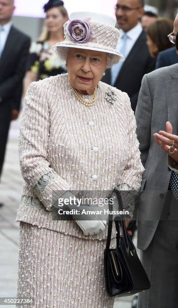 Queen Elizabeth ll visits the Marche aux Fleurs et aux Oiseaux on June 7, 2014 in Paris, France.
