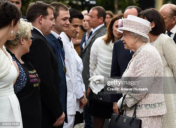 Queen Elizabeth ll meets wellwishers at the Marche aux Fleurs et aux Oiseaux on June 7, 2014 in Paris, France.