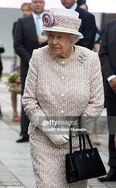 Queen Elizabeth ll visits the Marche aux Fleurs et aux Oiseaux on June 7, 2014 in Paris, France.