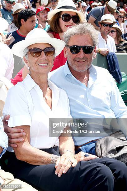 Managing Director Christine Lagarde and her husband Xavier Giocanti attend the Roland Garros French Tennis Open 2014 - Day 14 on June 7, 2014 in...