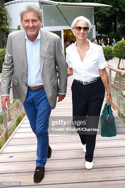 Managing Director Christine Lagarde and her husband Xavier Giocanti attend the Roland Garros French Tennis Open 2014 - Day 14 on June 7, 2014 in...