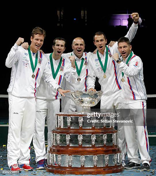 Tomas Berdych, Radek Stepanek team captain Vladimir Safarik, Lukas Rosol and Jan Hayek of Czech Republic hold the winners trophy aloft after a 3-2...