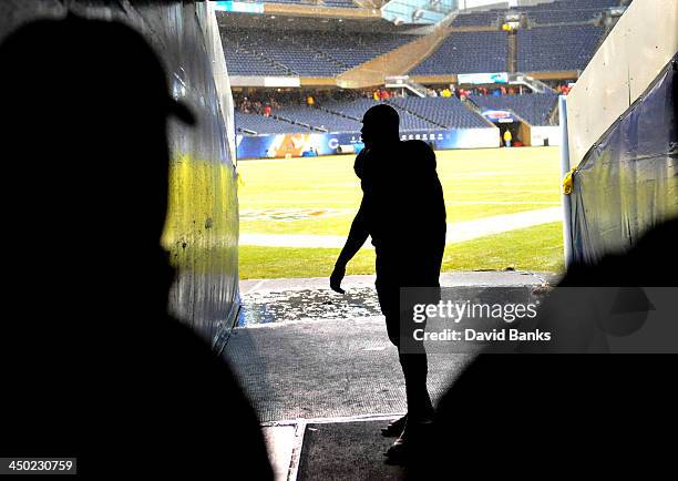 Michael Bush of the Chicago Bears looks at the field as fans evacuated the stadium because of weather after the game between the Chicago Bears and...