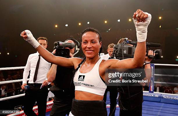 Cecilia Braekhus of Norway celebrates after winning her WBA WBC WBO female welterweight championship title fight against Jessica Balogun of Germany...