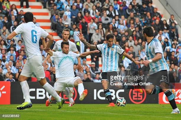 Ricardo Alvarez, of Argentina hits the ball to score a goal during a FIFA friendly match between Argentina and Slovenia at Ciudad de La Plata Stadium...