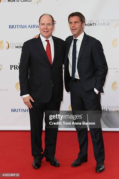 Prince Albert II of Monaco and Prince Emanuele Filiberto di Savoia attend the opening ceremony of the 54th Monte Carlo TV Festival at the Grimaldi...