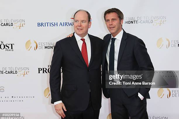 Prince Albert II of Monaco and Prince Emanuele Filiberto di Savoia attend the opening ceremony of the 54th Monte Carlo TV Festival at the Grimaldi...