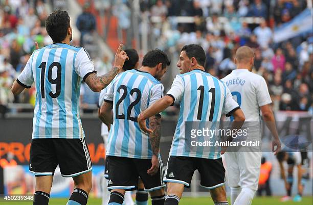 Ricardo Alvarez, of Argentina celebrates after scoring the first goal of his team of Argentina during a FIFA friendly match between Argentina and...