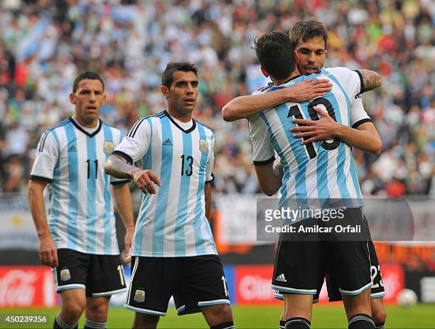 Ricardo Alvarez, of Argentina celebrates after scoring the first goal of his team of Argentina during a FIFA friendly match between Argentina and...