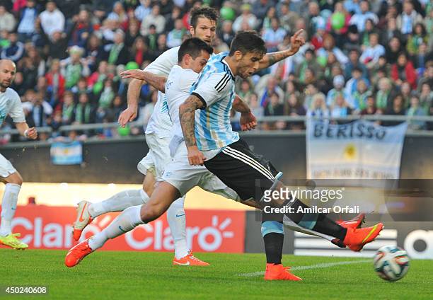 Ricardo Alvarez, of Argentina scores a goal during a FIFA friendly match between Argentina and Slovenia at Ciudad de La Plata Stadium on June 7, 2014...
