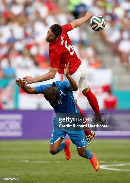 Gary Cahill of England challenges Jerry Bengtson of Honduras during the International Friendly match between England and Honduras at the Sun Life...