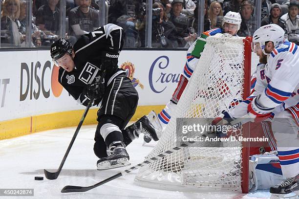 Tyler Toffoli of the Los Angeles Kings handles the puck behind the goal against the New York Rangers in the first period of Game Two of the Stanley...