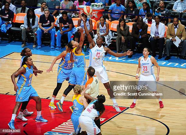 Aneika Henry of the Atlanta Dream wins a jump ball against Courtney Clements of the Chicago Sky on June 7, 2014 at Philips Arena in Atlanta, Georgia....