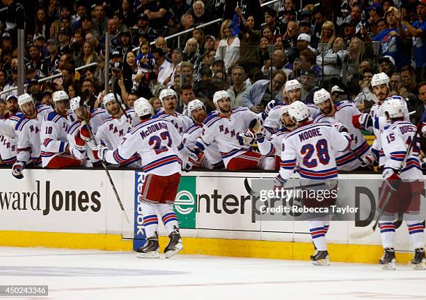 Ryan McDonagh of the New York Rangers celebrates his goal against the Los Angeles Kings with teammates during the first period of Game Two of the...