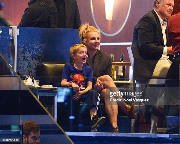 Britney Spears and her son Jayden James Federline attend a hockey game between the New York Rangers and the Los Angeles Kings in Game Two of the 2014...