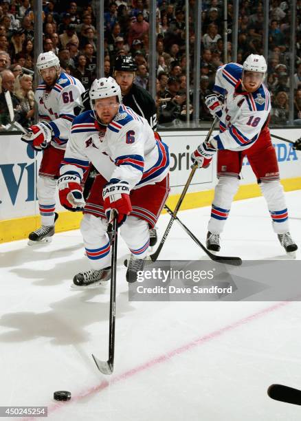 Anton Stralman of the New York Rangers controls the puck against the Los Angeles Kings during the second period of Game Two of the 2014 Stanley Cup...