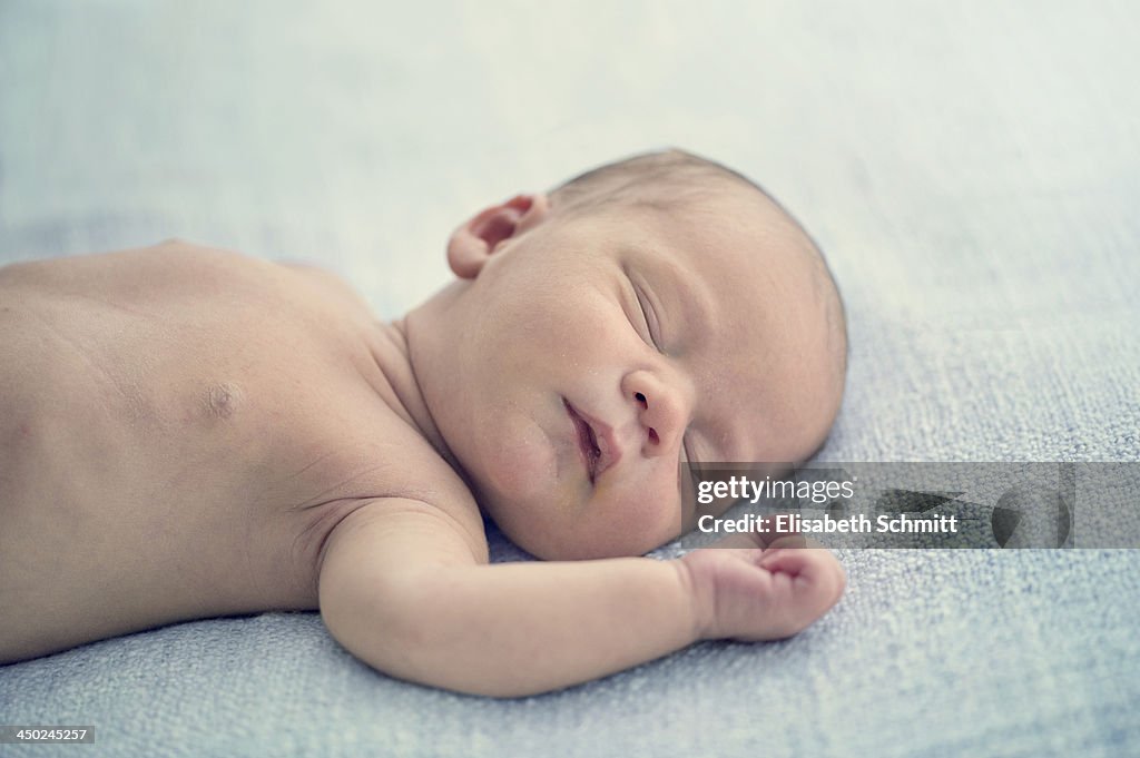 Newborn with bare chest
