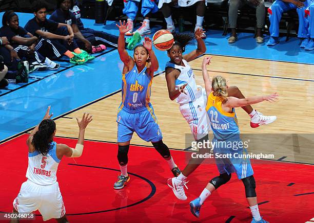 Tiffany Hayes of the Atlanta Dream passes the ball against Courtney Clements of the Chicago Sky on June 7, 2014 at Philips Arena in Atlanta, Georgia....