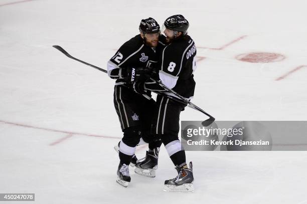 Marian Gaborik of the Los Angeles Kings celebrates his third period goal with teammate Drew Doughty against the New York Rangers during Game Two of...