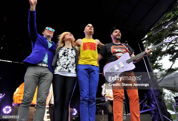 Musicians Chris Allen, Elaine Bradley, Tyler Glenn and Branden Campbell of the band Neon Trees pose onstage during Chipotle's Cultivate San...
