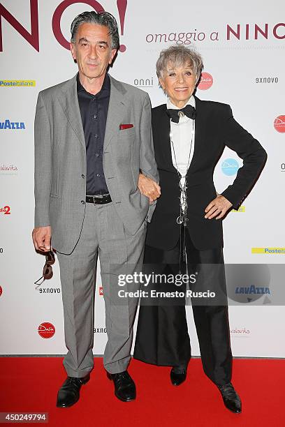 Oliviero Rainaldi and Erminia Ferrari attend the Homage To Nino Manfredi photocall at Auditorium della Conciliazione on June 7, 2014 in Rome, Italy.