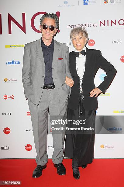 Oliviero Rainaldi and Erminia Ferrari attend the Homage To Nino Manfredi photocall at Auditorium della Conciliazione on June 7, 2014 in Rome, Italy.