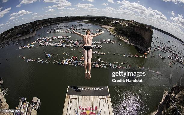 In this handout image provided by Red Bull, Andy Jones of the USA dives from the 28 metre platform at Hells Gate during the second stop of the Red...