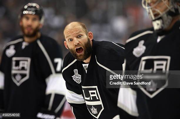 Robyn Regehr of the Los Angeles Kings warms up before playing in Game One of the 2014 Stanley Cup Final against the New York Rangers at Staples...