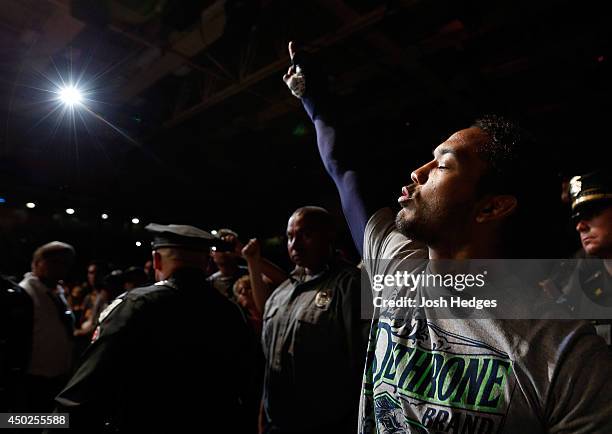 Benson Henderson enters the arena before his lightweight fight against Rustam Khabilov during the UFC Fight Night event at Tingley Coliseum on June...