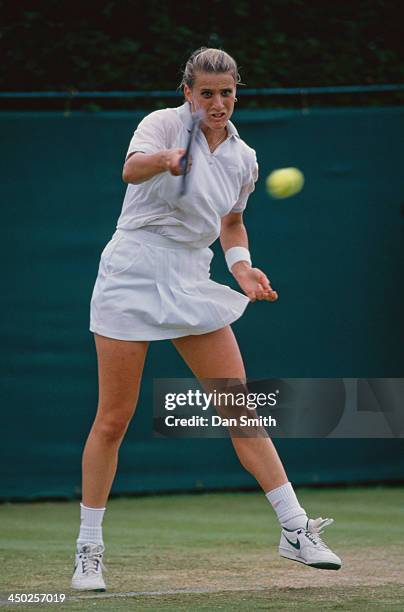 British tennis player Monique Javer competing at the Wimbledon Lawn Tennis Championships, London, June 1988. Javer was knocked out in the first round.