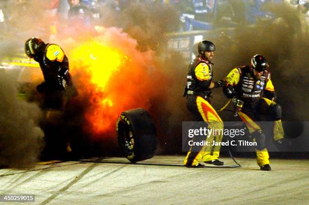 The MOEN/Menards Chevrolet, driven by Paul Menard, explodes during the NASCAR Sprint Cup Series Ford EcoBoost 400 at Homestead-Miami Speedway on...