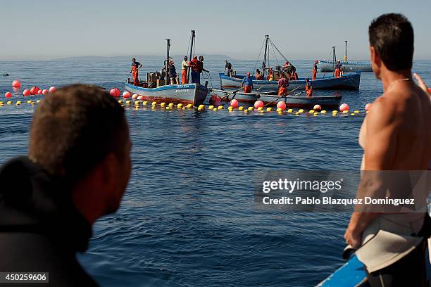 Fishermen boats prepare to fish bluenfin tunas during the end of the Almadraba tuna fishing season on June 3, 2014 near the Barbate coast, in Cadiz...